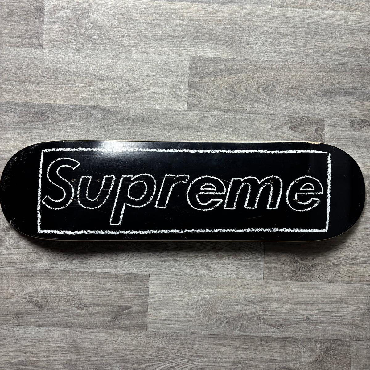 Supreme KAWS Chalk Logo Skateboard Deck (Black)